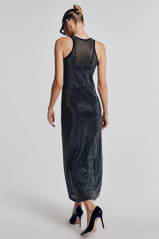 Vestido longo tule cristais visto de costas. A transparência e o brilho estão por todo o modelo.